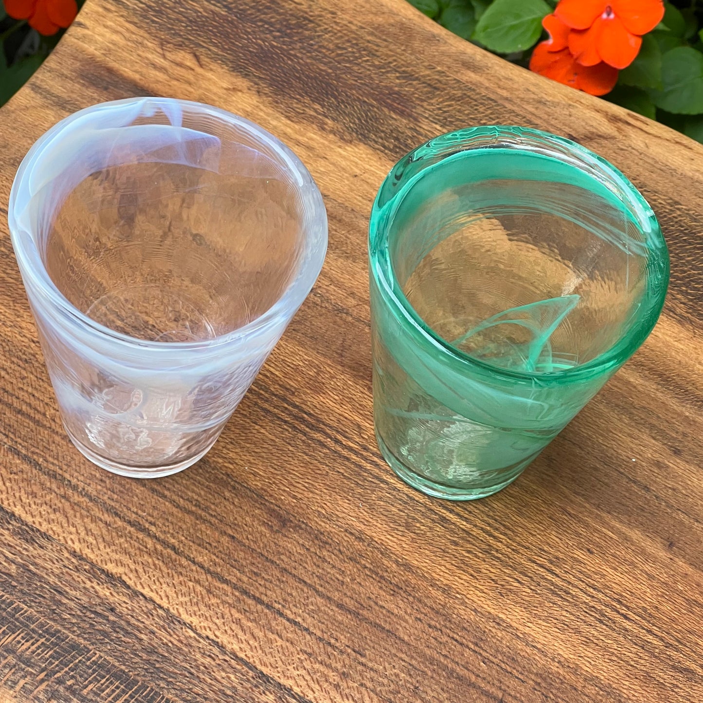 Two Kosta Boda Ulrica Hydman Vallien Soft White and Soft Green Tumblers
