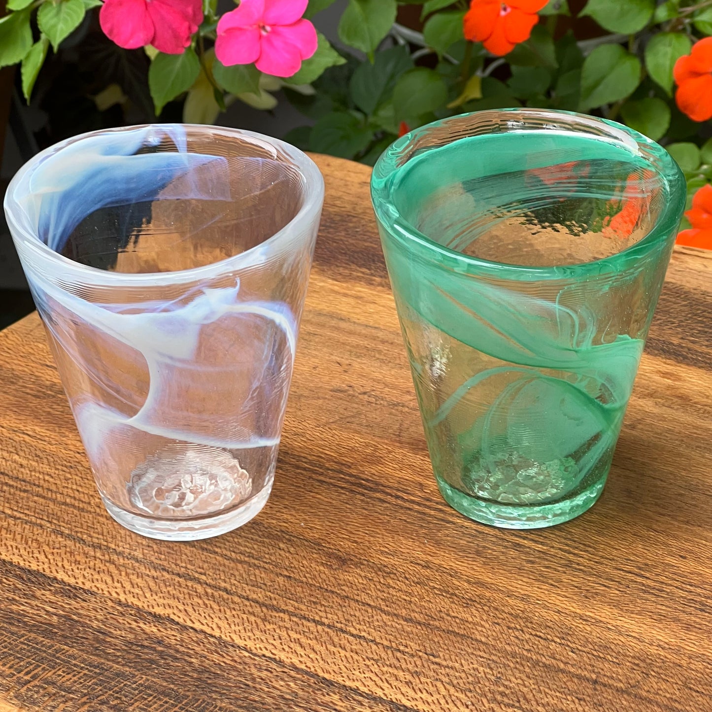 Two Kosta Boda Ulrica Hydman Vallien Soft White and Soft Green Tumblers