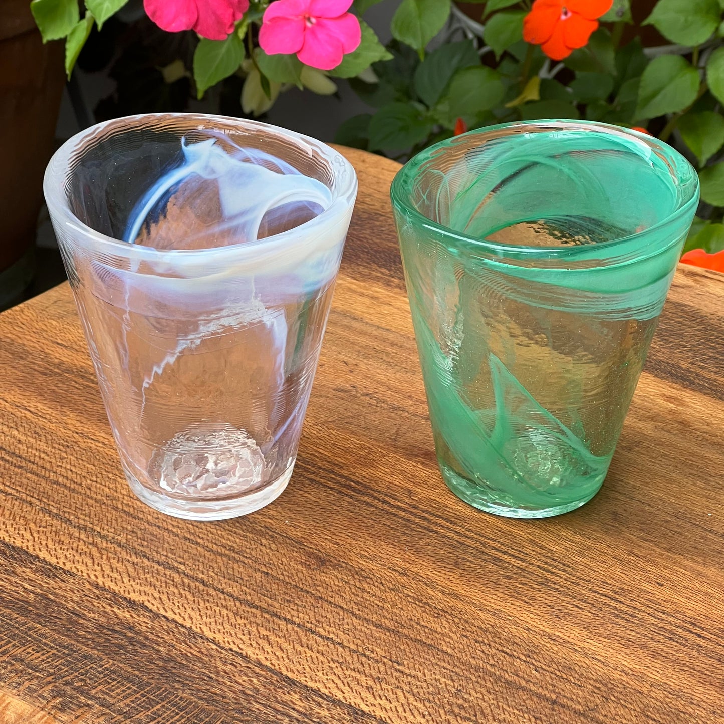 Two Kosta Boda Ulrica Hydman Vallien Soft White and Soft Green Tumblers