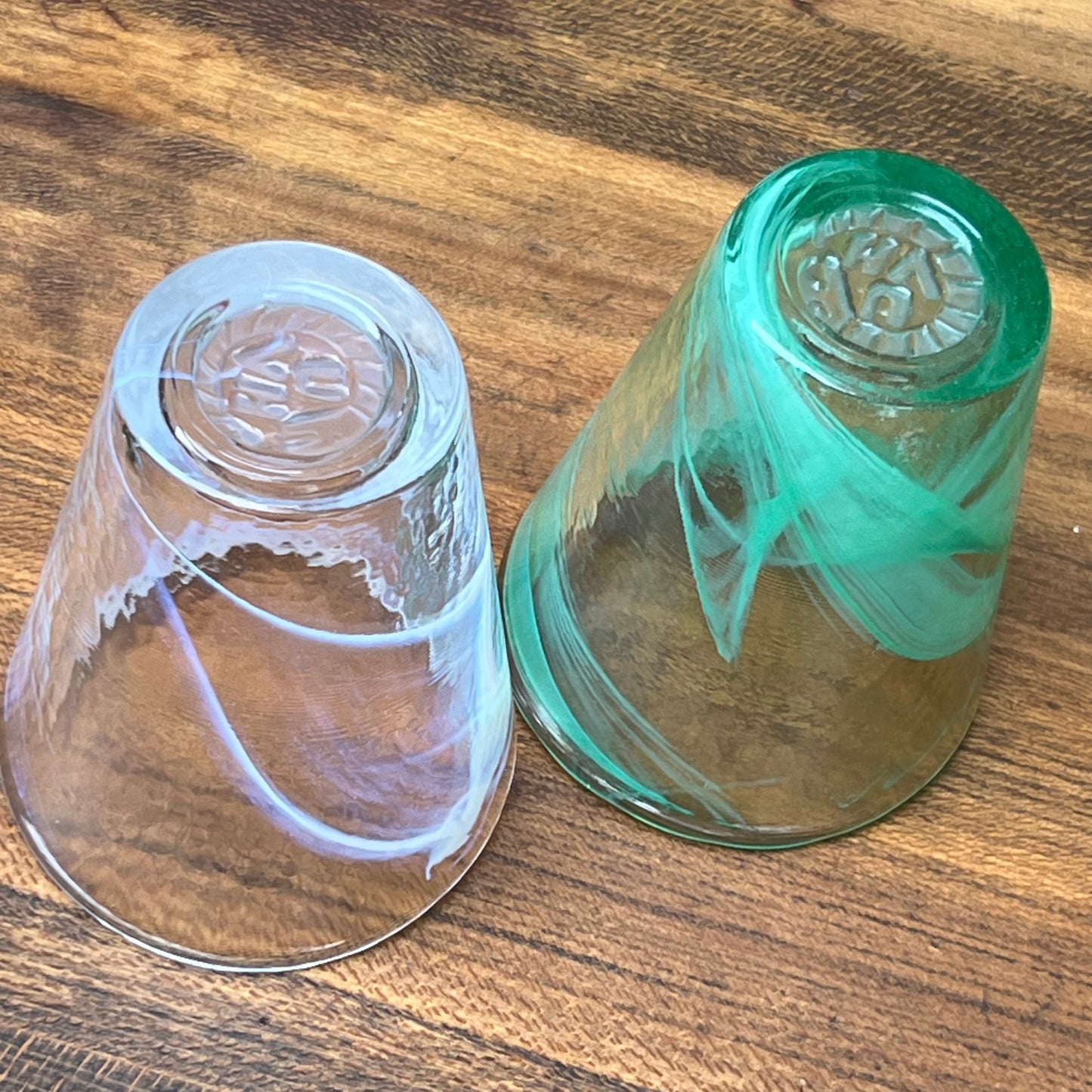 Two Kosta Boda Ulrica Hydman Vallien Soft White and Soft Green Tumblers