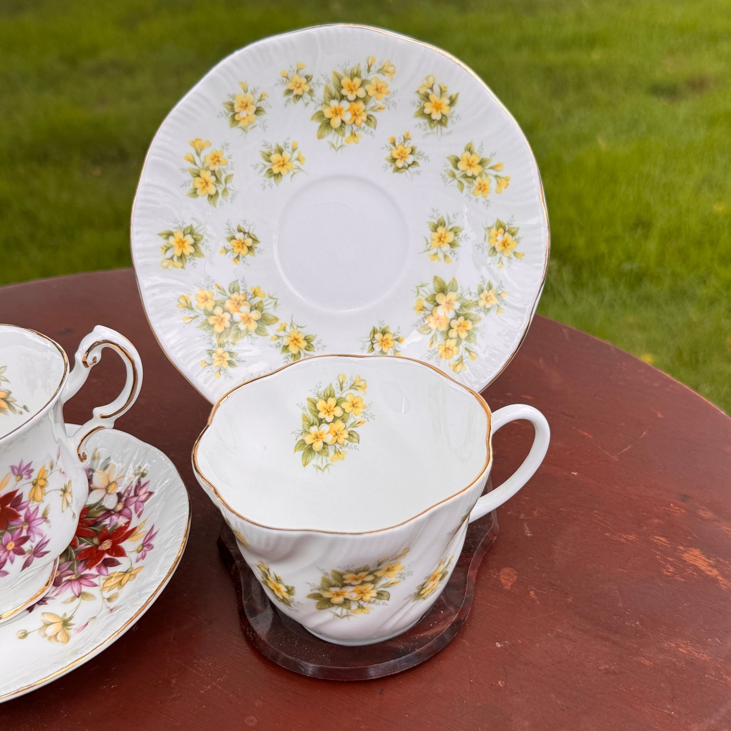 Two English Tea Cups & Saucers Queen's Primrose Countryside Series & Paragon Flower Festival