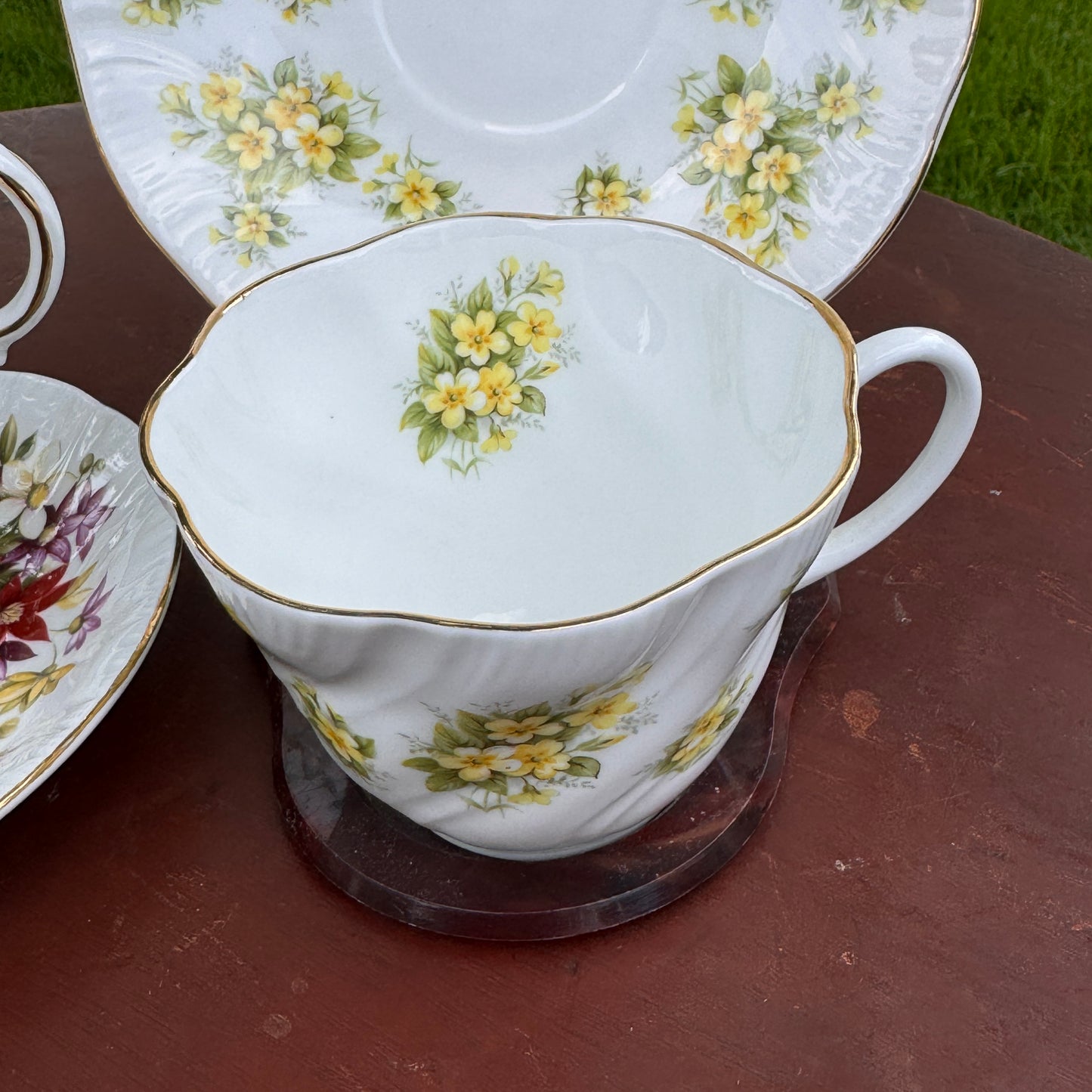 Two English Tea Cups & Saucers Queen's Primrose Countryside Series & Paragon Flower Festival
