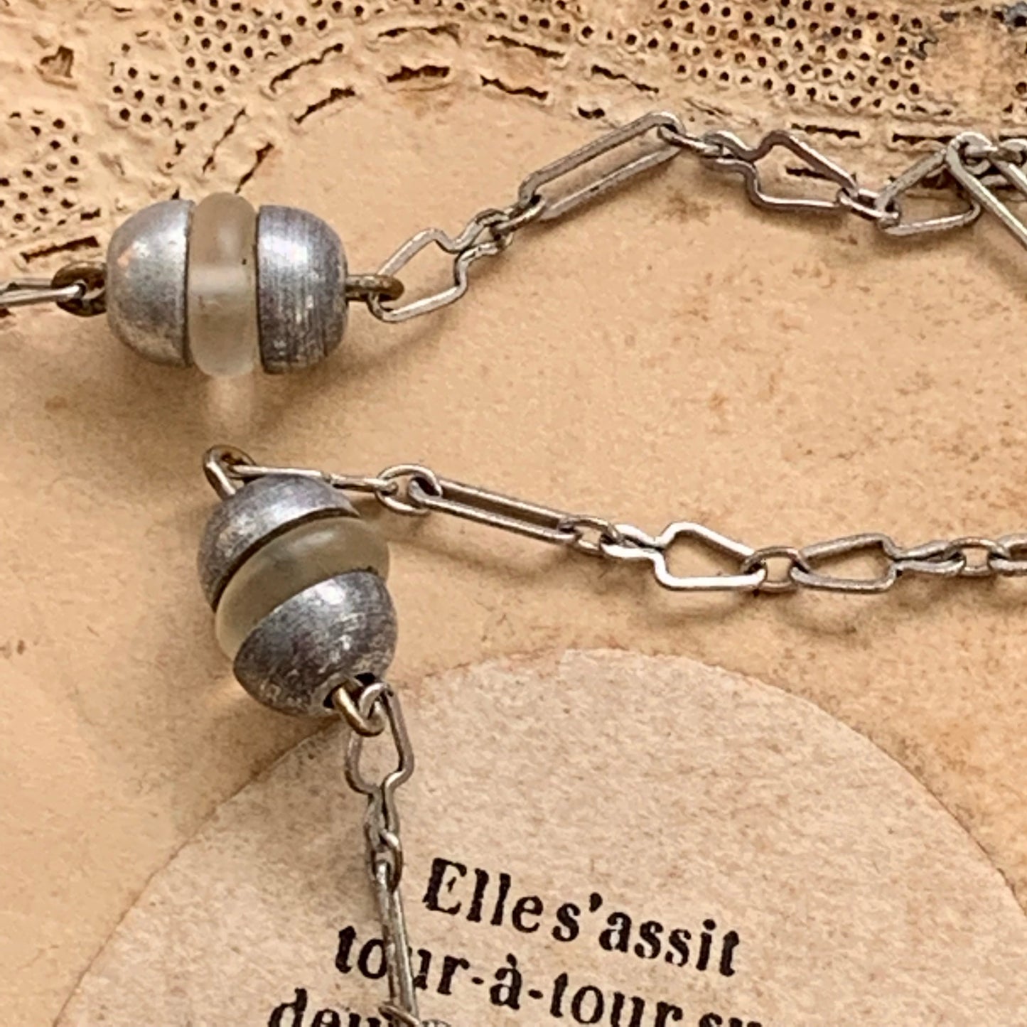 Art Deco Carved Plastic And Silver Bead Necklace - Lady Slippers