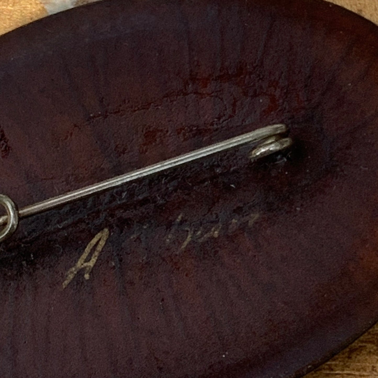 Close up artist's signature.