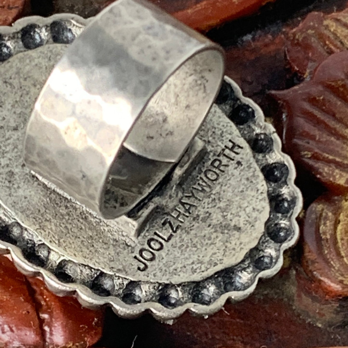Artist signature. ring adjusts