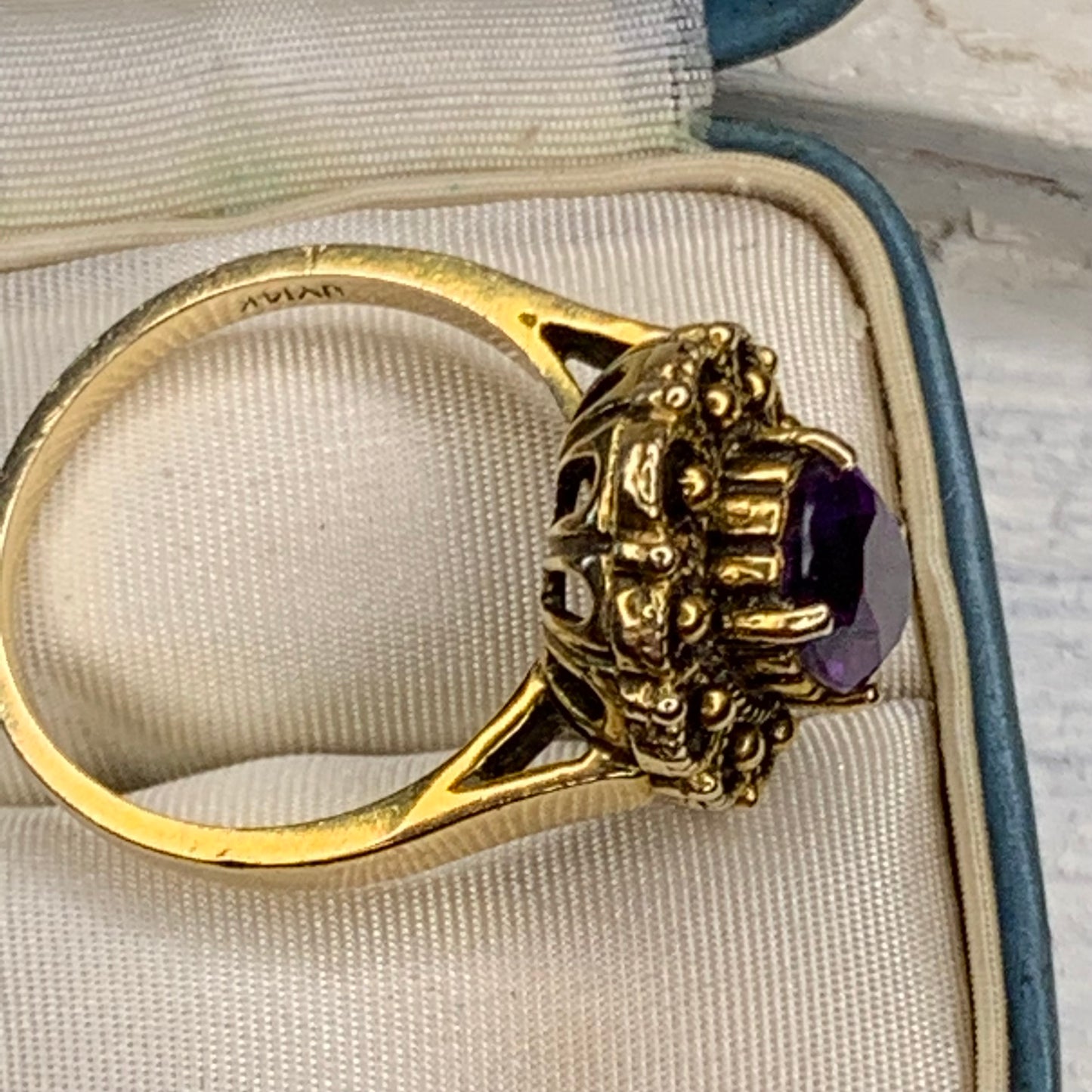 14k gold high prong setting