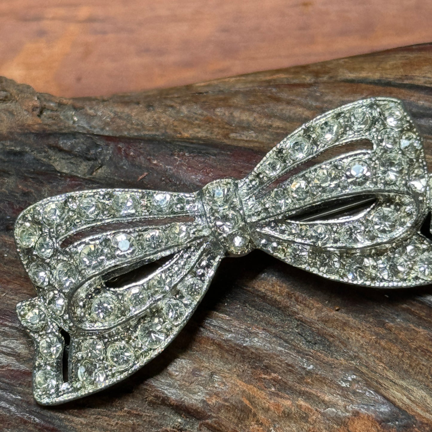 Vintage Pot Metal Clear Multi Faceted Rhinestone Bow Pin