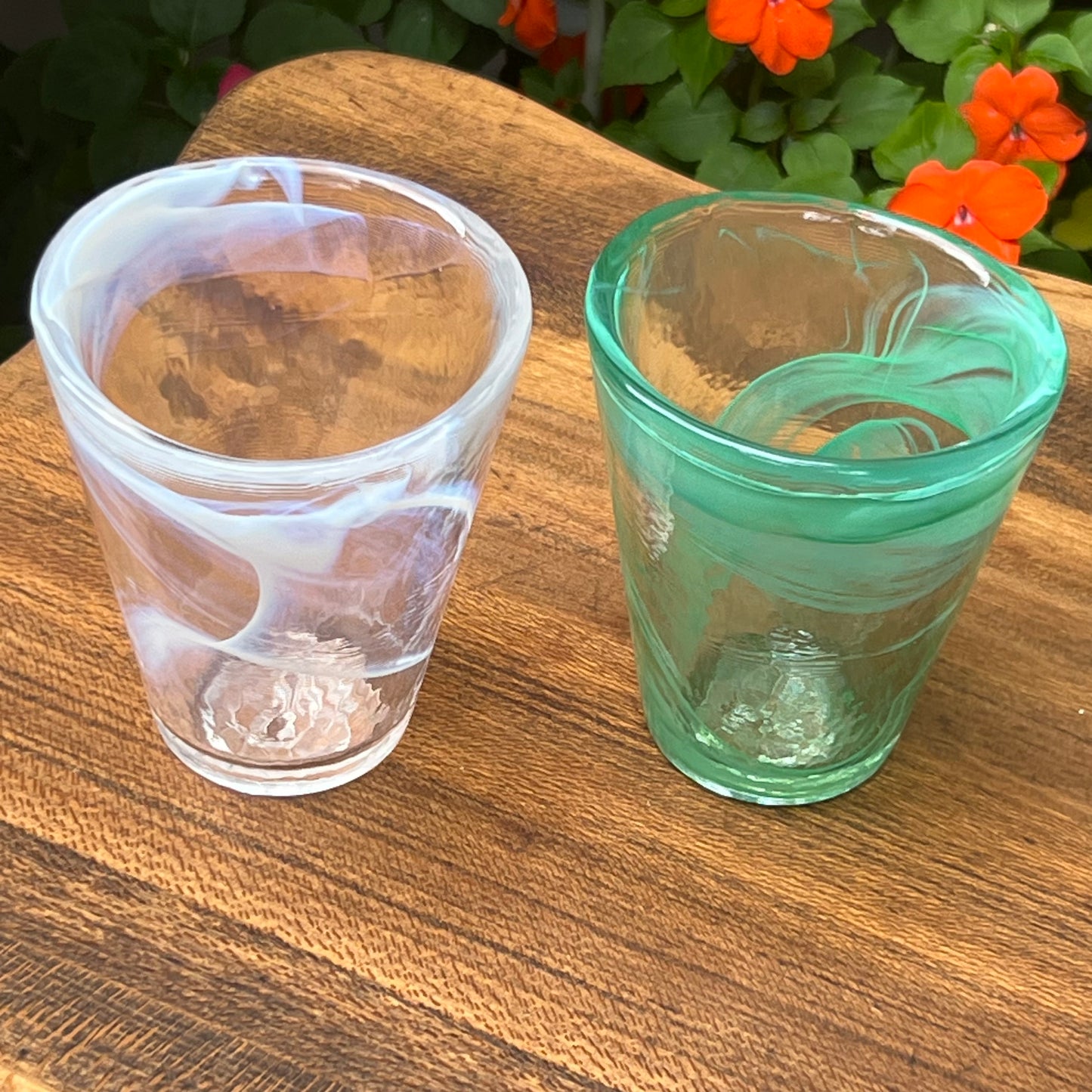 Two Kosta Boda Ulrica Hydman Vallien Soft White and Soft Green Tumblers