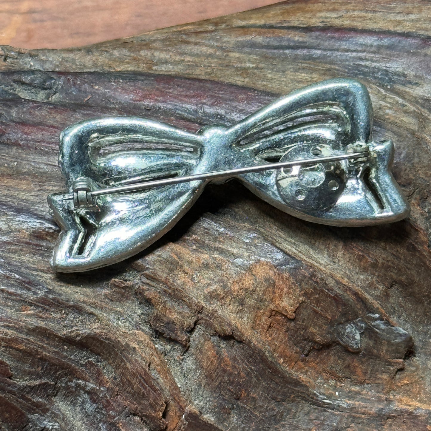 Vintage Pot Metal Clear Multi Faceted Rhinestone Bow Pin