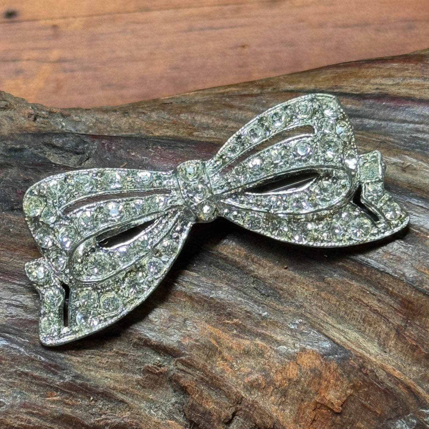 Vintage Pot Metal Clear Multi Faceted Rhinestone Bow Pin