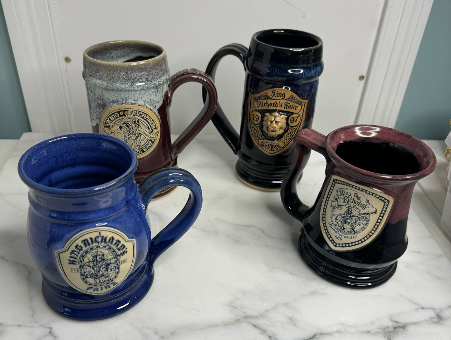 Four King Richard's Faire Pottery Mugs