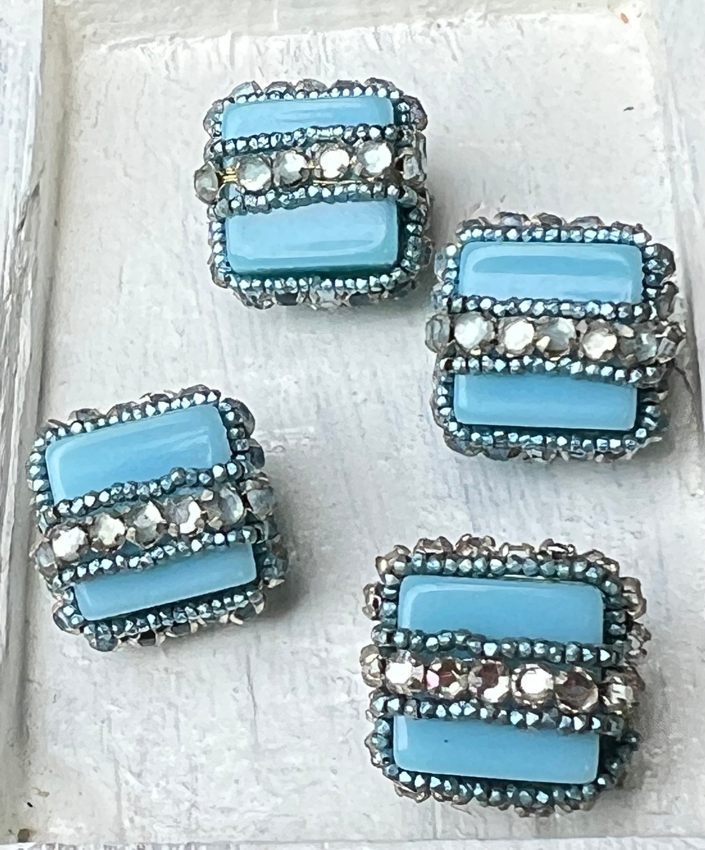 Four Vintage Soft Blue and Flat Back Rhinestone Rondels