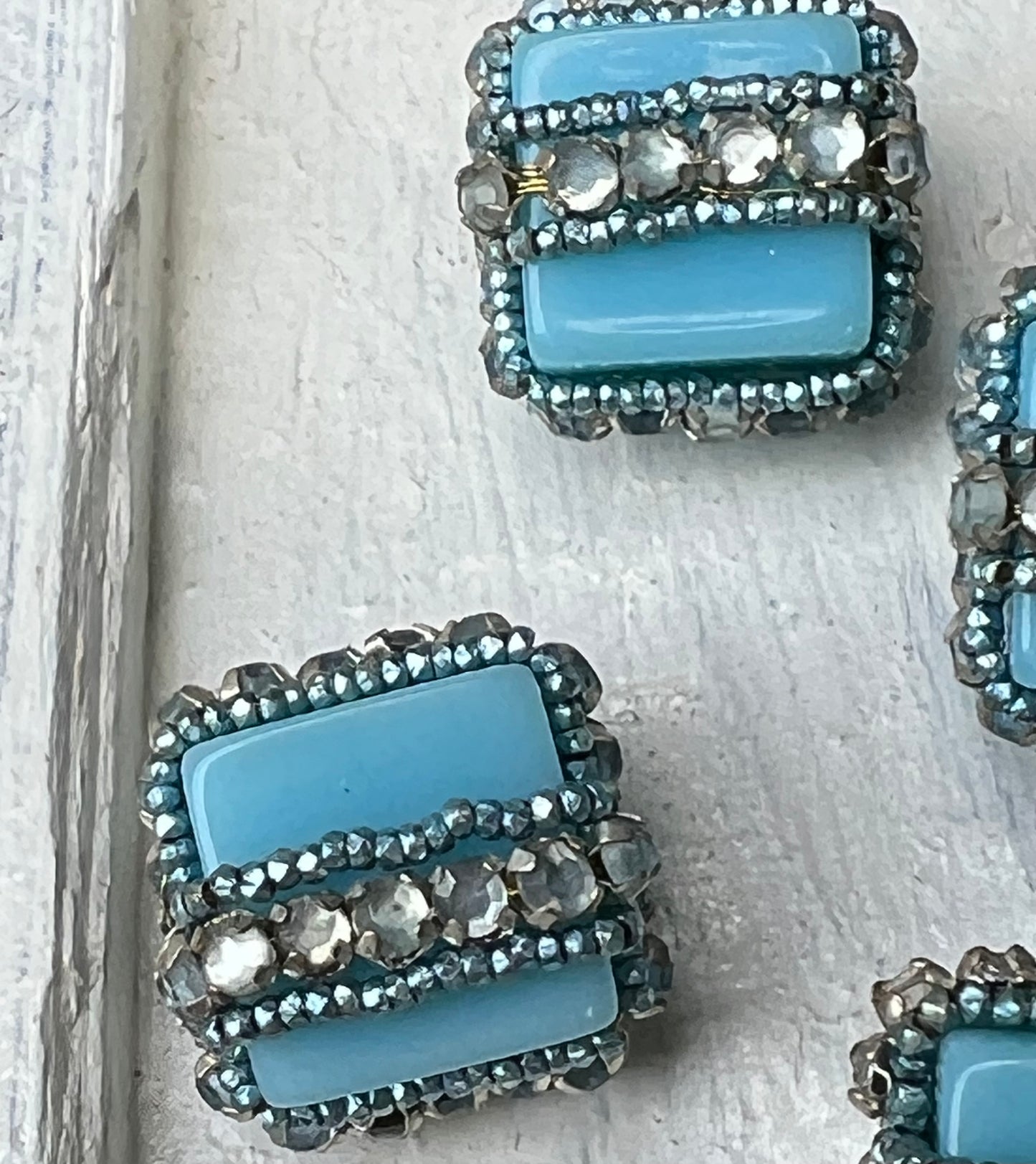 Four Vintage Soft Blue and Flat Back Rhinestone Rondels