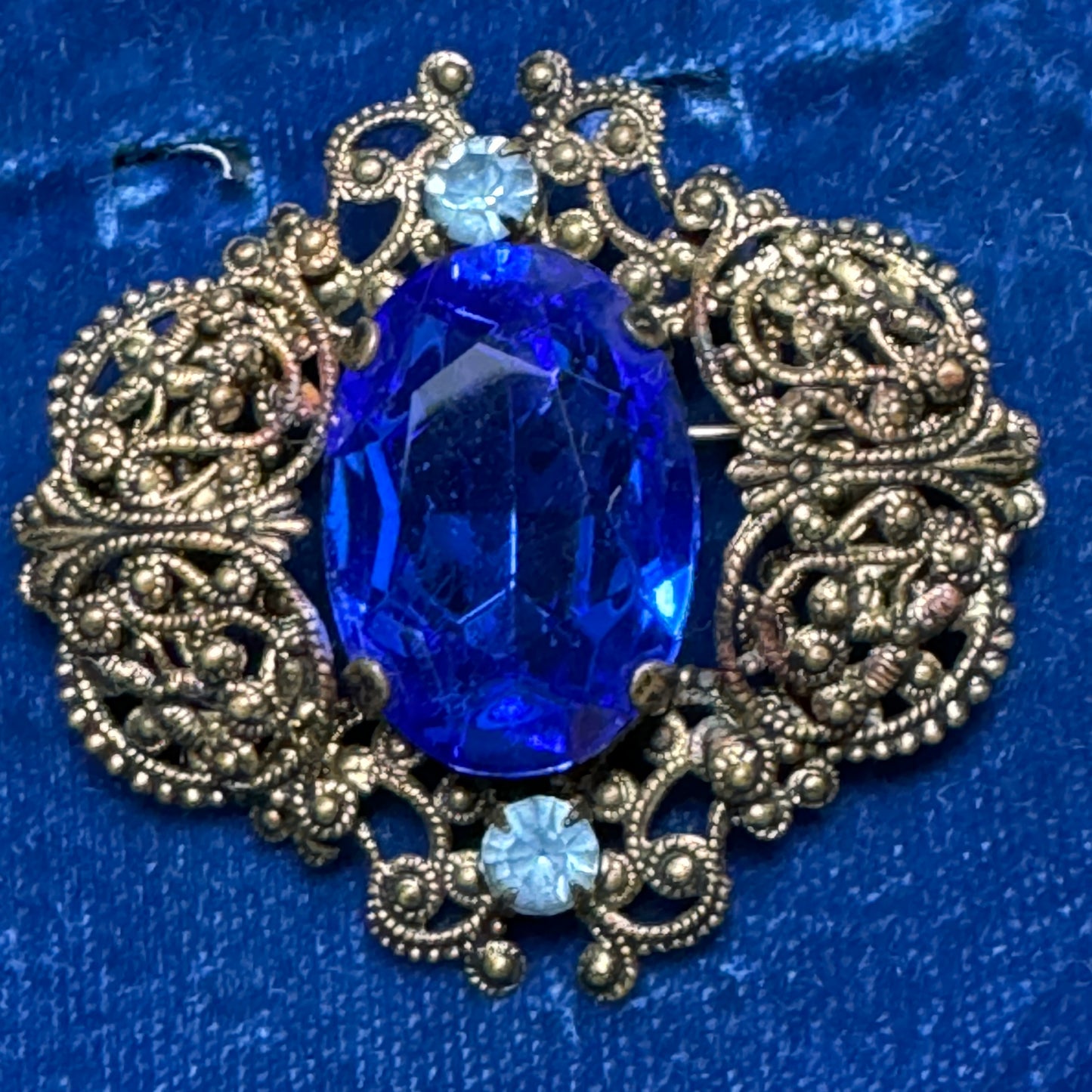 Deep Blue Multi Faceted Gilt Filigree Brooch