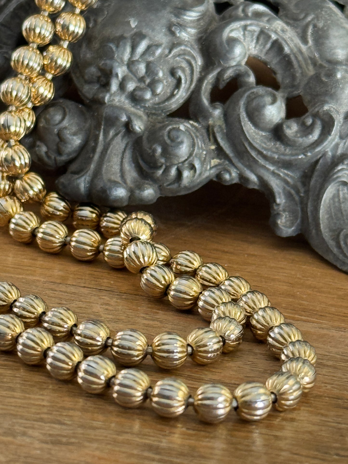 Vintage Monet Gold Tone Metal Bead Long Necklace