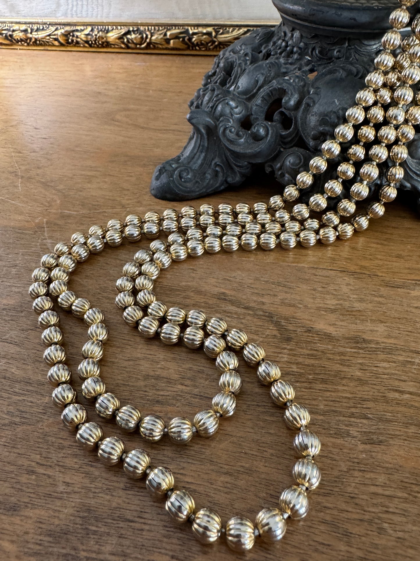 Vintage Monet Gold Tone Metal Bead Long Necklace