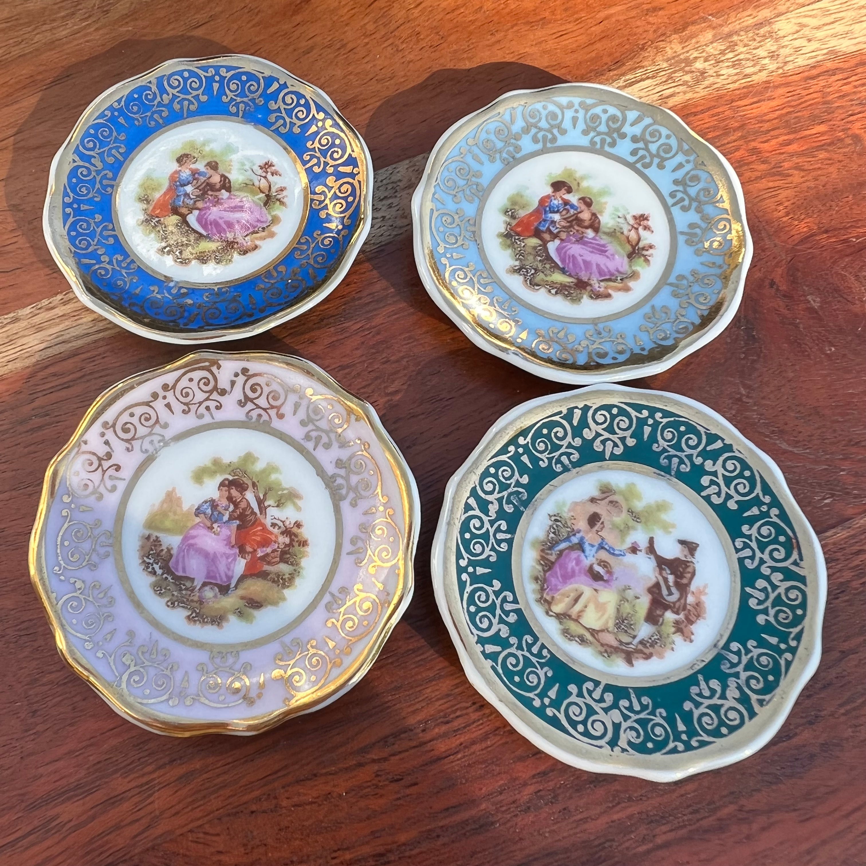 Service 4 piece porcelain limoges painted custom 2 shops plates, timbale and cocker